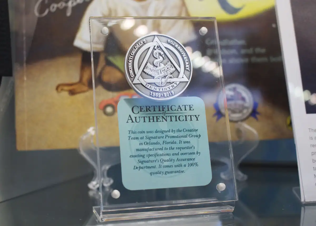 Photo of a commemorative pin submitted by Dentistry Division