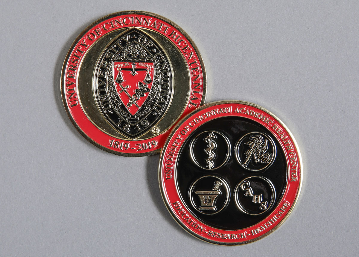Photo of commemorative UC College of Medicine coins