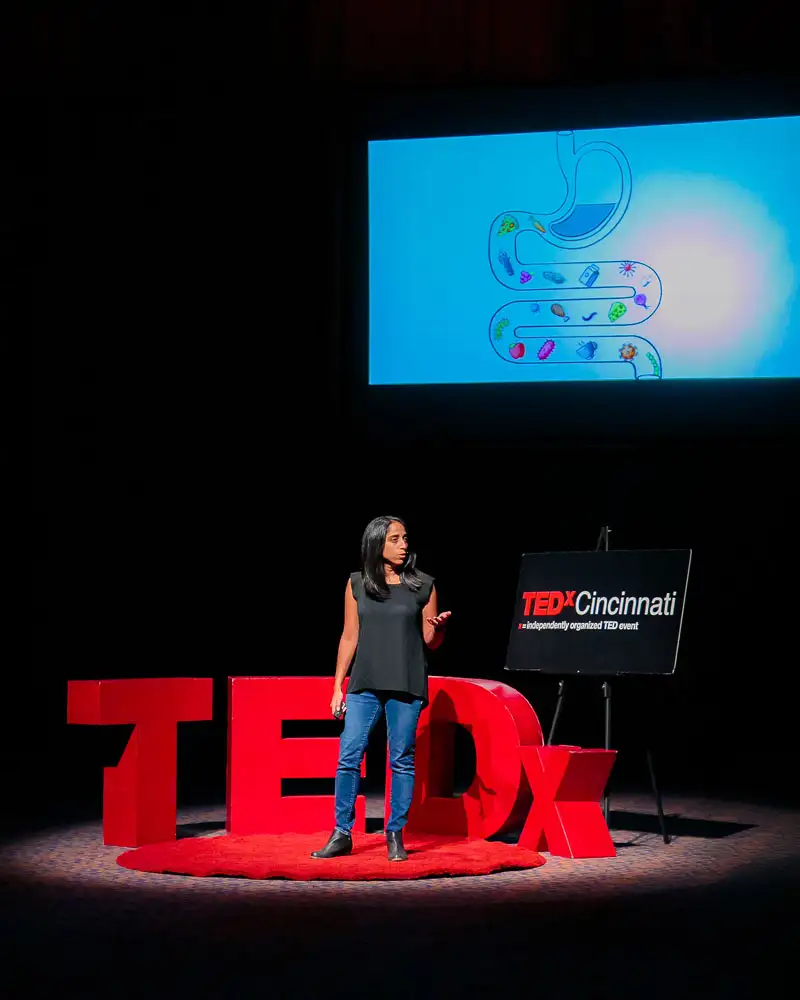 Photo of Theresa Alenghat presenting at TEDx CincinnatiWomen 2021