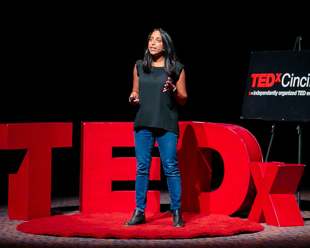 Photo of Theresa Alenghat presenting at TEDx CincinnatiWomen 2021