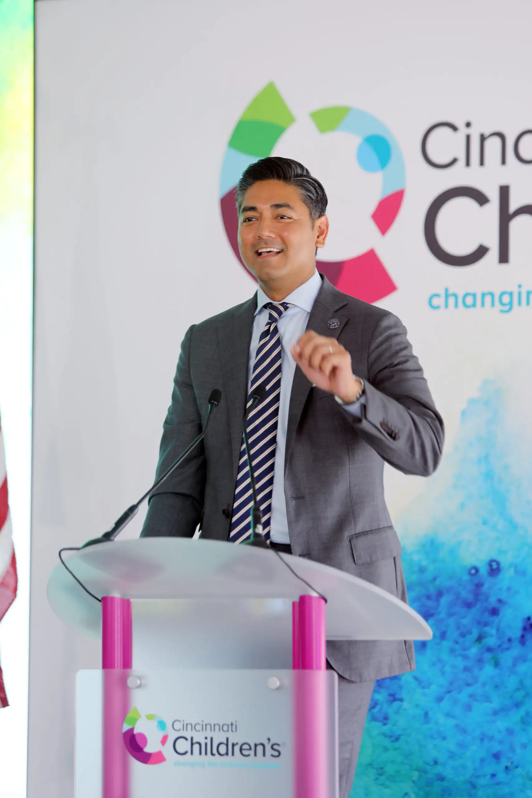Cincinnati Mayor Aftab Pureval speaking at a podium.