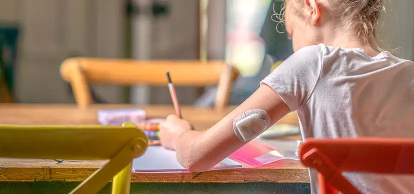 Diabetic Teen Doing Homework