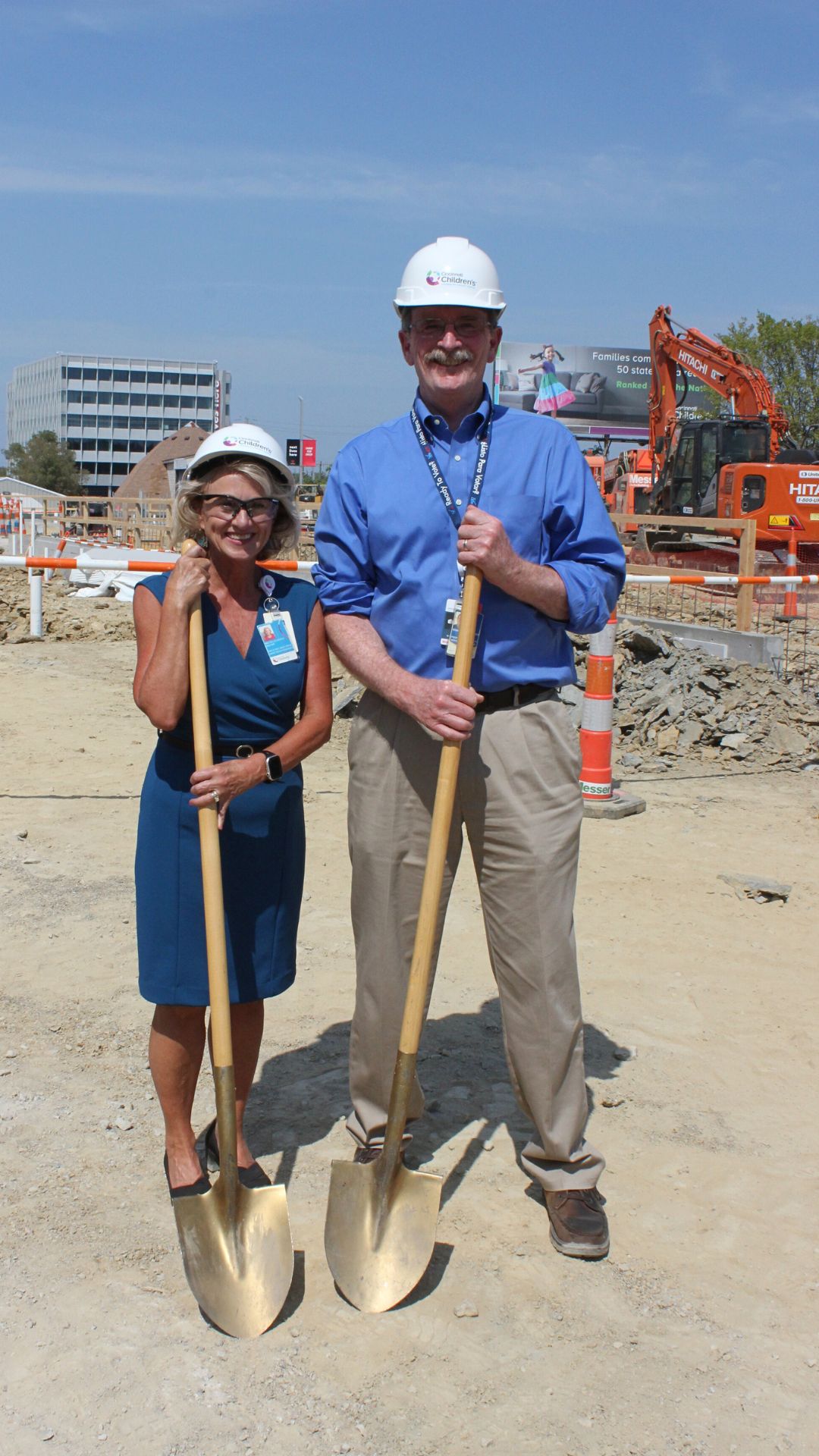 Photo of Michelle Dickey, APRN, MS, field service instructor, Division of Infectious Diseases, and Robert Frenck, MD, professor, director of the Gamble Vaccine Research Center and executive chair of the Institutional Review Board, at the Winslow Research Pavilion groundbreaking.