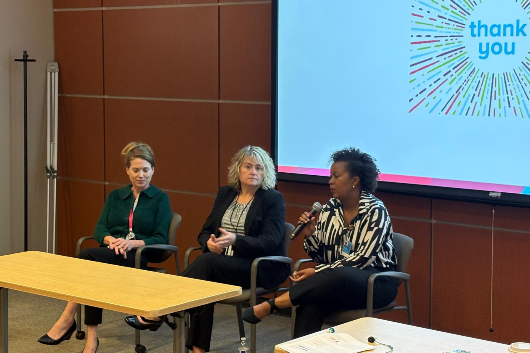 photo of Leah Kottyan, PhD, Sherry Thornton, PhD, and Tafadzwa Chihanga, PhD, leading a panel on Women in Science.