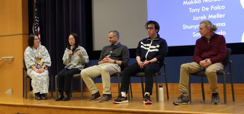 photo of people speaking in a panel on stage at Cincinnati Children's Sabin Auditorium